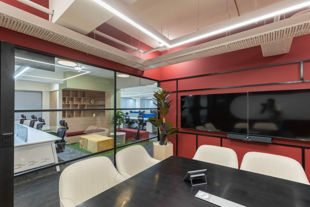 The best office interior designers in Chennai produced a sophisticated work environment. The picture shows a sleek office that is current and fashionable, with lots of natural light and colorful accents